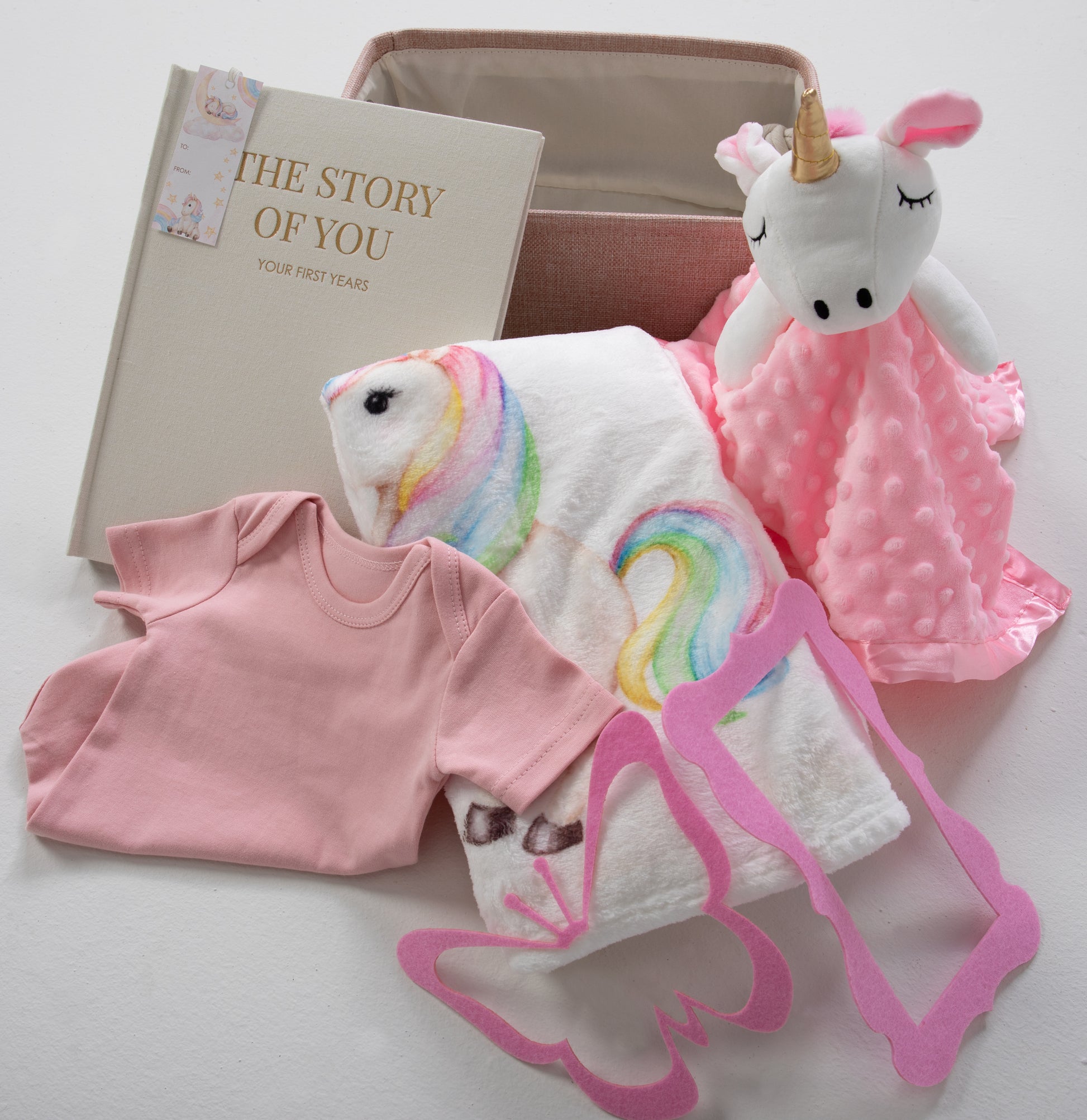 Our baby Gift Basket a delightful assortment of carefully chosen items, including a milestone baby blanket, stuffed plush, plush baby lovey, baby memory book and reusable storage basket. cherish every moment for a truly memorable present.