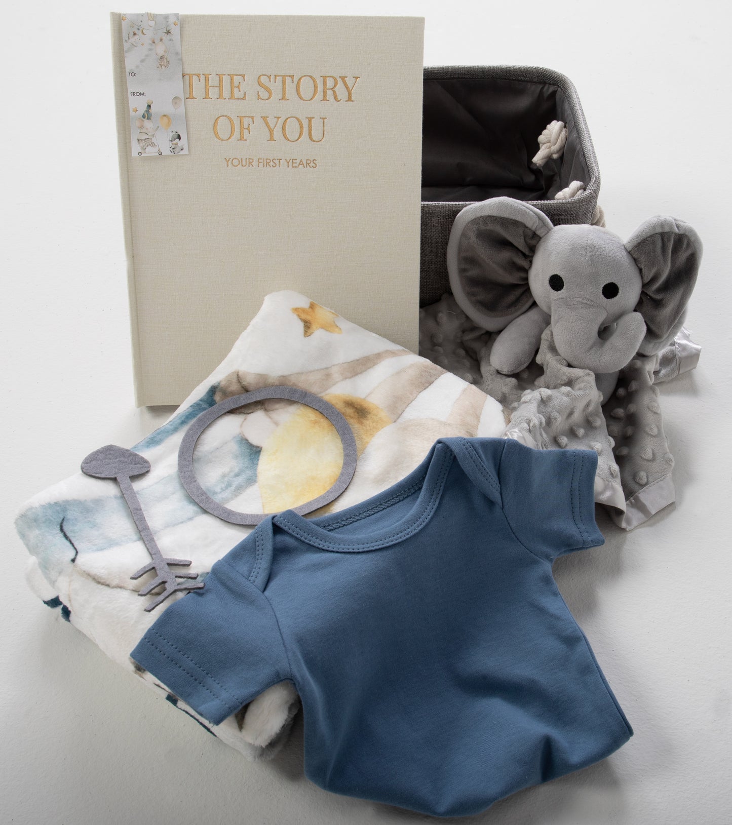 Introducing our Milestone Moments Gift Basket - the perfect way to celebrate every precious moment in a baby's journey. Whether you're welcoming a new addition to the family or attending a baby shower, this thoughtfully curated gift basket is sure to bring joy and create lasting memories. Embrace every moment, big and small, and make them even more special with our Milestone Moments Gift Basket. Order yours today and let the journey of a lifetime begin.