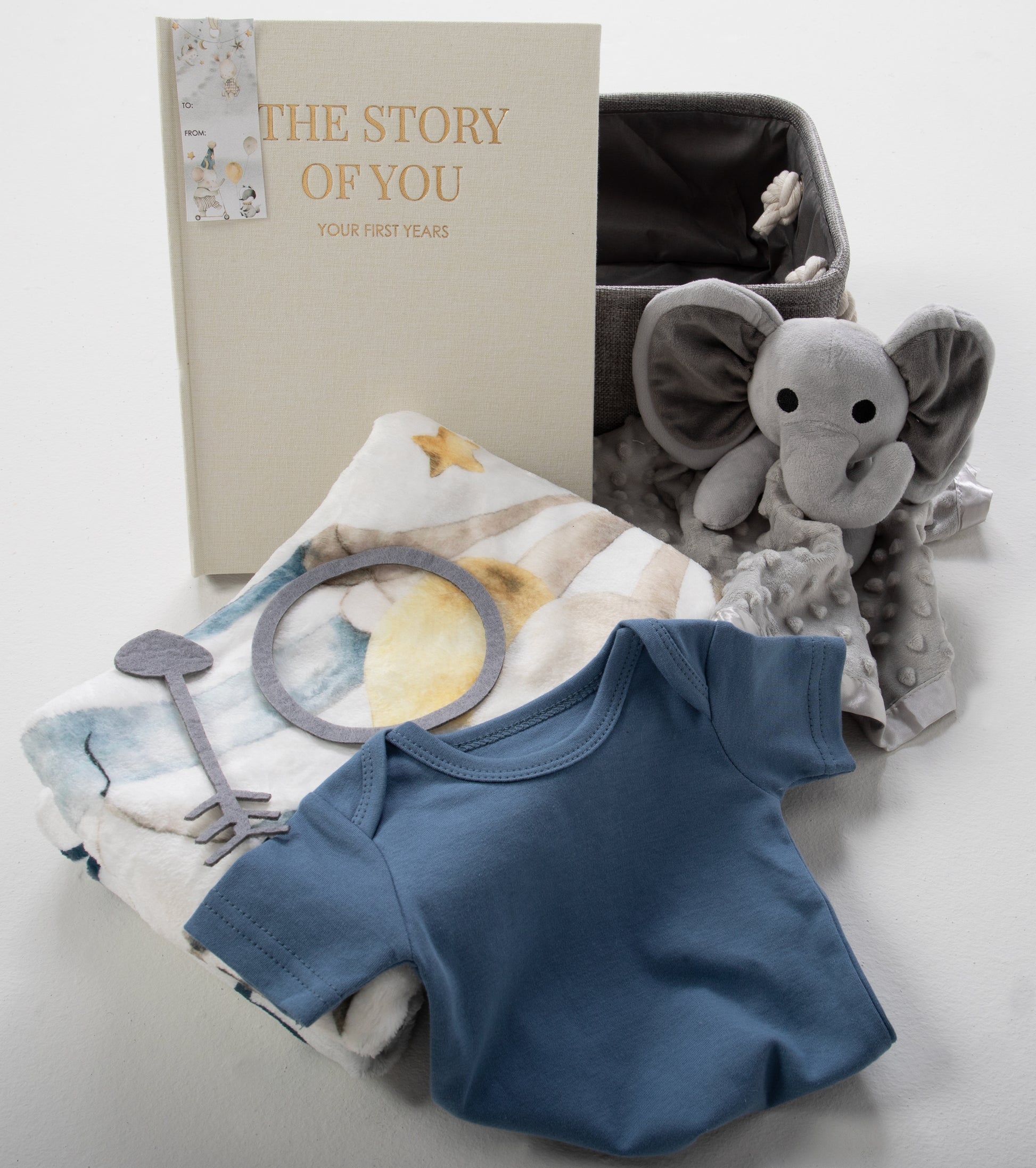 Introducing our Milestone Moments Gift Basket - the perfect way to celebrate every precious moment in a baby's journey. Whether you're welcoming a new addition to the family or attending a baby shower, this thoughtfully curated gift basket is sure to bring joy and create lasting memories. Embrace every moment, big and small, and make them even more special with our Milestone Moments Gift Basket. Order yours today and let the journey of a lifetime begin.