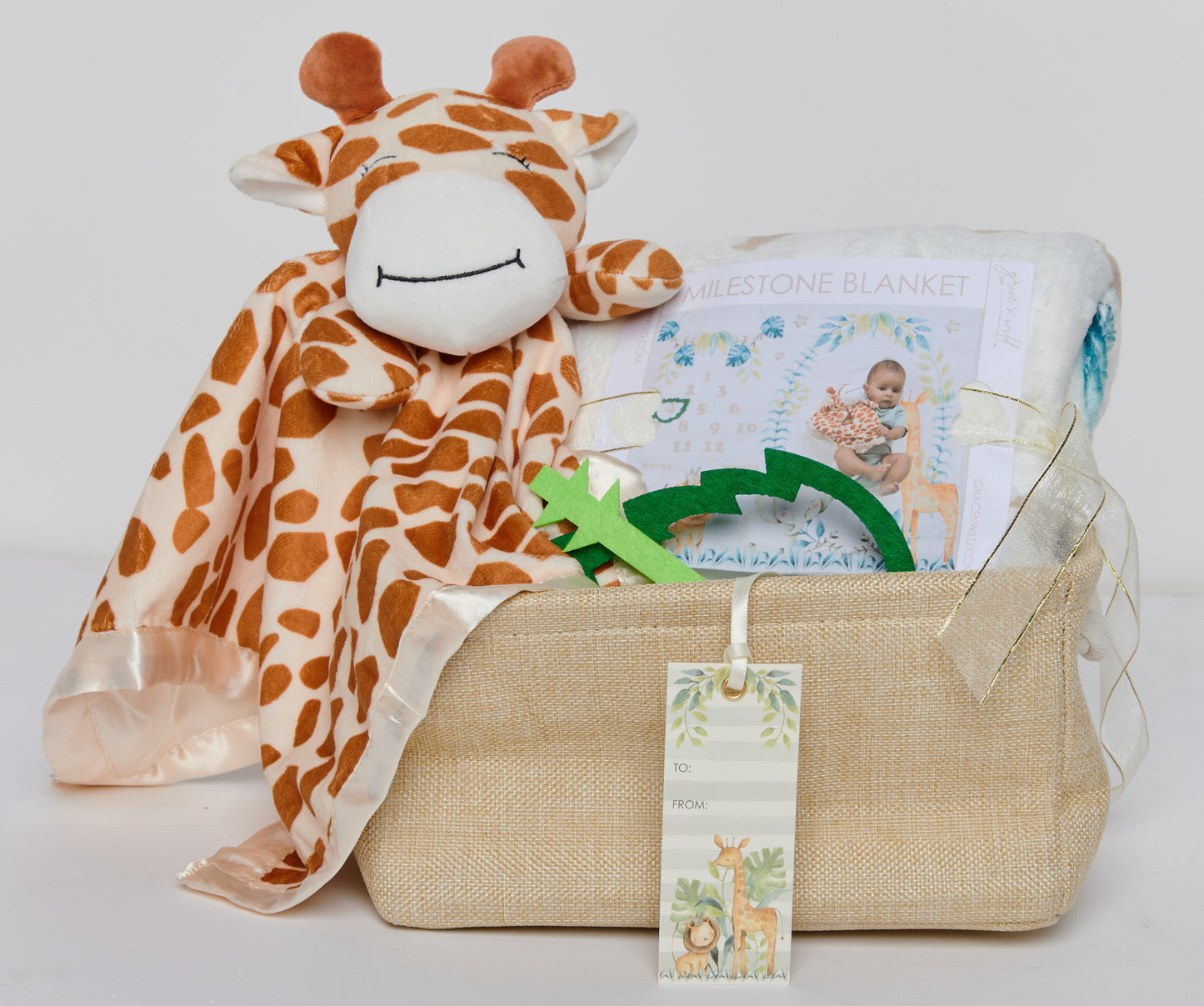Celebrate every precious moment of your little one's journey with our beautifully curated Baby Milestone Basket. This thoughtfully designed gift set combines essential items to make your baby's first year full of memories and joy. Whether you're gifting it to a new parent or preparing for your own bundle of joy, this basket is a delightful choice that will be cherished for years to come.