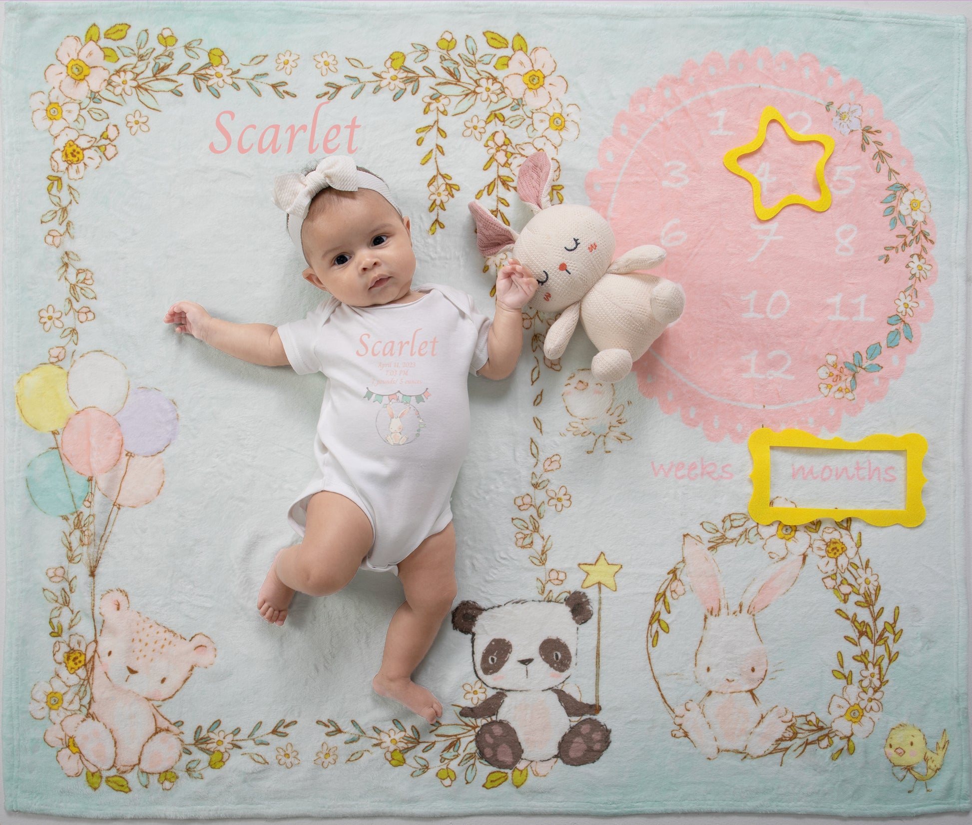 The personalized milestone blanket captures the unique journey of the newborn's first year. Milestone markers accompany the blanket, allowing parents to mark and treasure each significant moment along the way.