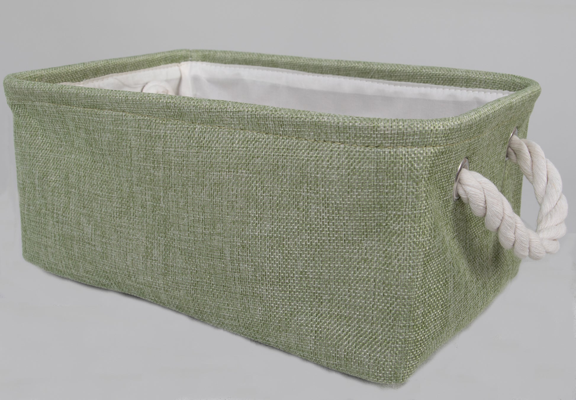 Keep all of your baby's essentials organized with our versatile green storage basket. It's not only a practical addition to the nursery but also a stylish one, adding a touch of charm to the room's decor.  Thick rope handles add a stylish tough to the basket and make it easy to transport.