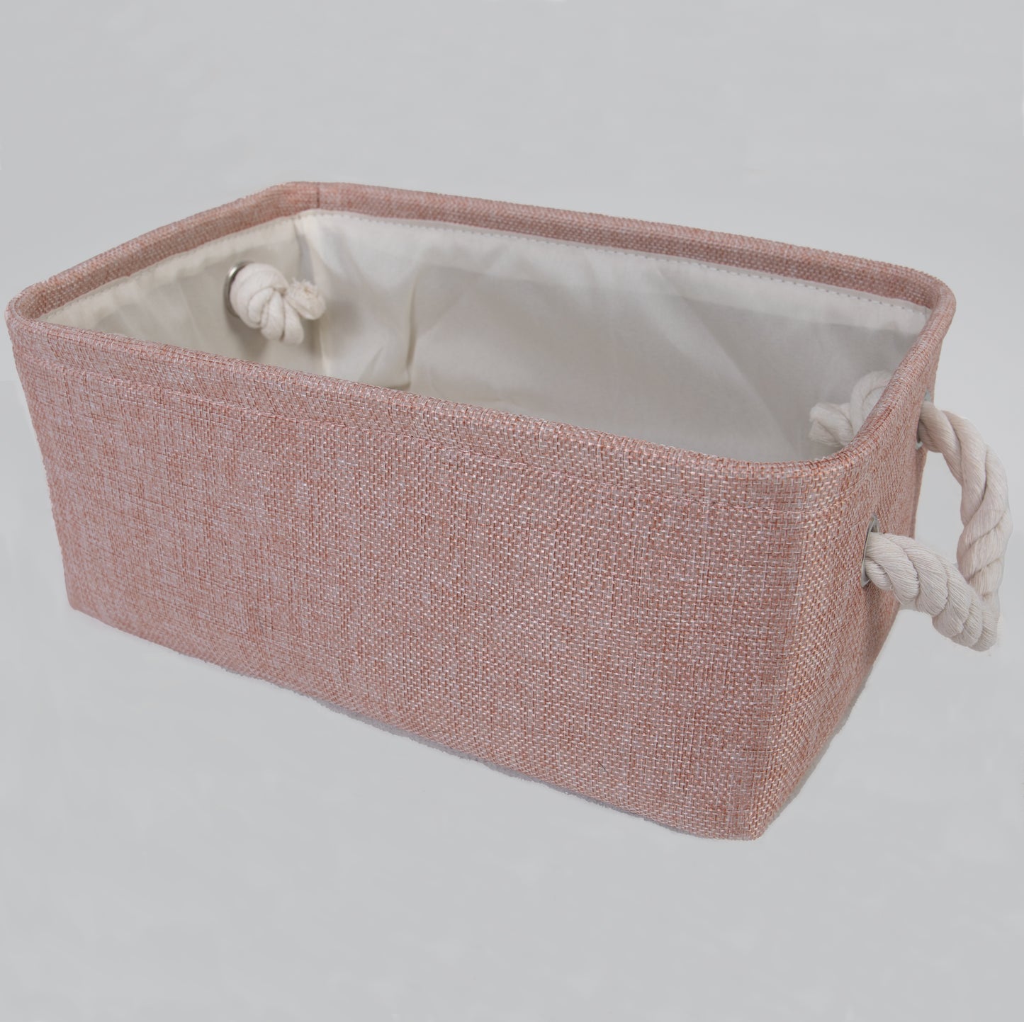 Keep all of your baby's essentials organized with our versatile pink storage basket. It's not only a practical addition to the nursery but also a stylish one, adding a touch of charm to the room's decor. 12" W x 8" D x 5" H